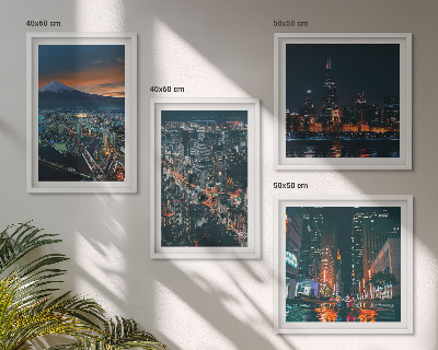Set de 4 cuadros para salón Vista de la ciudad desde la montaña por la noche.