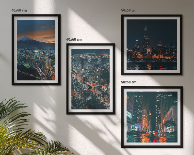 Set de 4 cuadros para salón Vista de la ciudad desde la montaña por la noche.