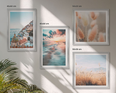 Galería de pared Casas con flores al atardecer en el mar