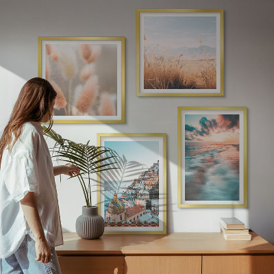 Galería de pared Casas con flores al atardecer en el mar