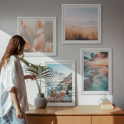 Galería de pared Casas con flores al atardecer en el mar