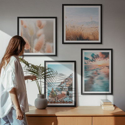 Galería de pared Casas con flores al atardecer en el mar