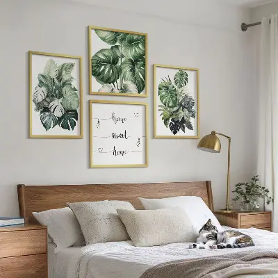 Set de cuadros modernos para salón con diseño de acuarela de hojas tropicales verdes