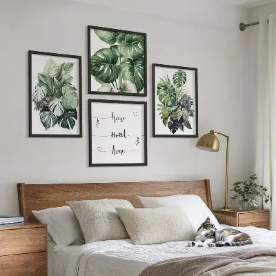 Set de cuadros modernos para salón con diseño de acuarela de hojas tropicales verdes