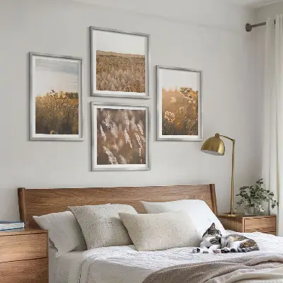 Set de 4 cuadros para salón motivo de praderas de verano con flores y puesta de sol