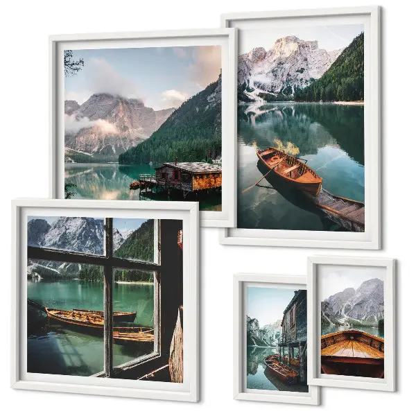 Pared galería de arte con motivos de lagos, montañas, barcos y paisajes