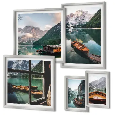 Pared galería de arte con motivos de lagos, montañas, barcos y paisajes