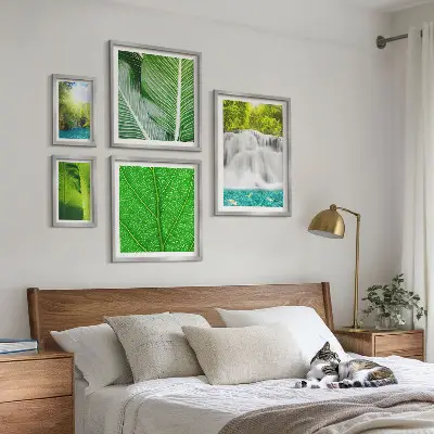 Conjunto de cuadros decorativos con diseño de cascadas y palmeras tropicales