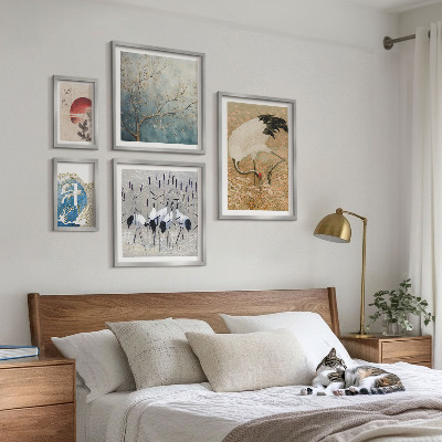 Pared galería de arte Elegantes pinturas de naturaleza con representaciones de aves.
