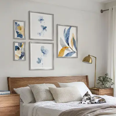 Conjunto de cuadros decorativos con motivos vegetales en tonos pastel