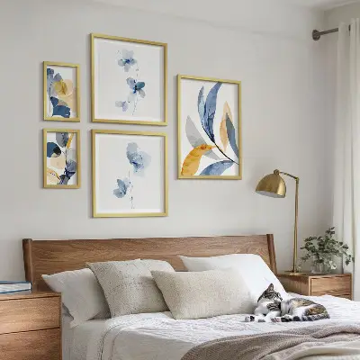 Conjunto de cuadros decorativos con motivos vegetales en tonos pastel