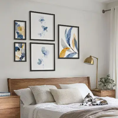 Conjunto de cuadros decorativos con motivos vegetales en tonos pastel