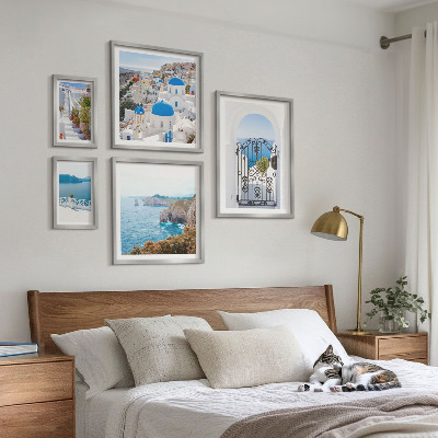 Pared galería de arte Casas de Santorini bajo el mar azul