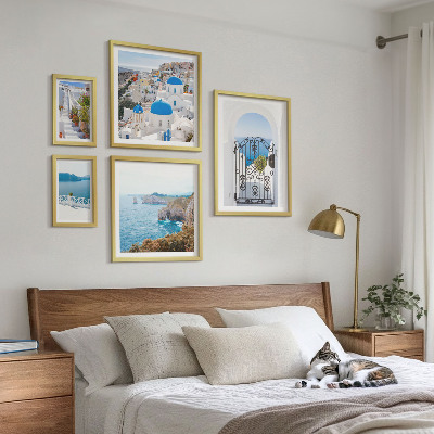 Pared galería de arte Casas de Santorini bajo el mar azul