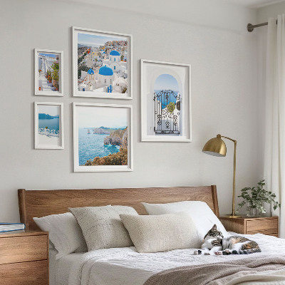 Pared galería de arte Casas de Santorini bajo el mar azul