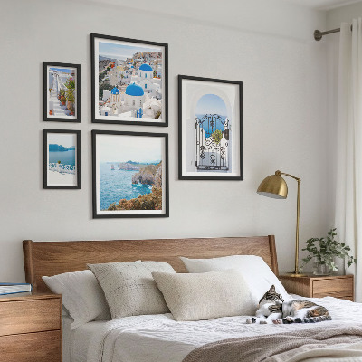 Pared galería de arte Casas de Santorini bajo el mar azul