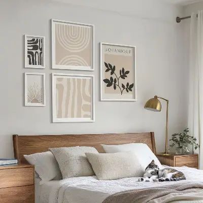 Conjunto de cuadros decorativos con motivos vegetales en tonos neutros