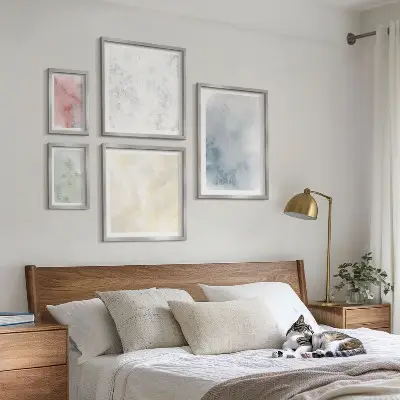 Conjunto de cuadros decorativos con acuarelas en tonos pastel sobre lienzo