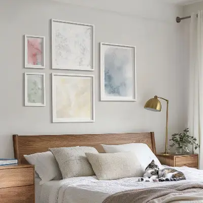 Conjunto de cuadros decorativos con acuarelas en tonos pastel sobre lienzo