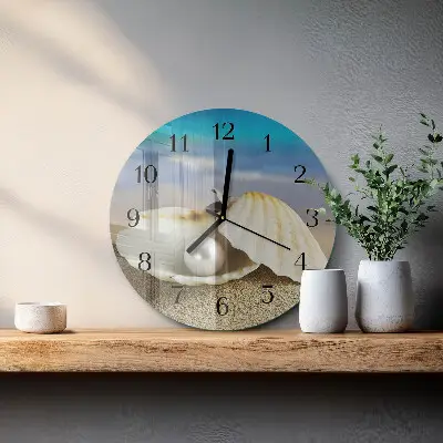 Redondo reloj de pared de vidrio Perla en una concha