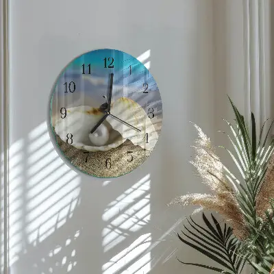 Redondo reloj de pared de vidrio Perla en una concha